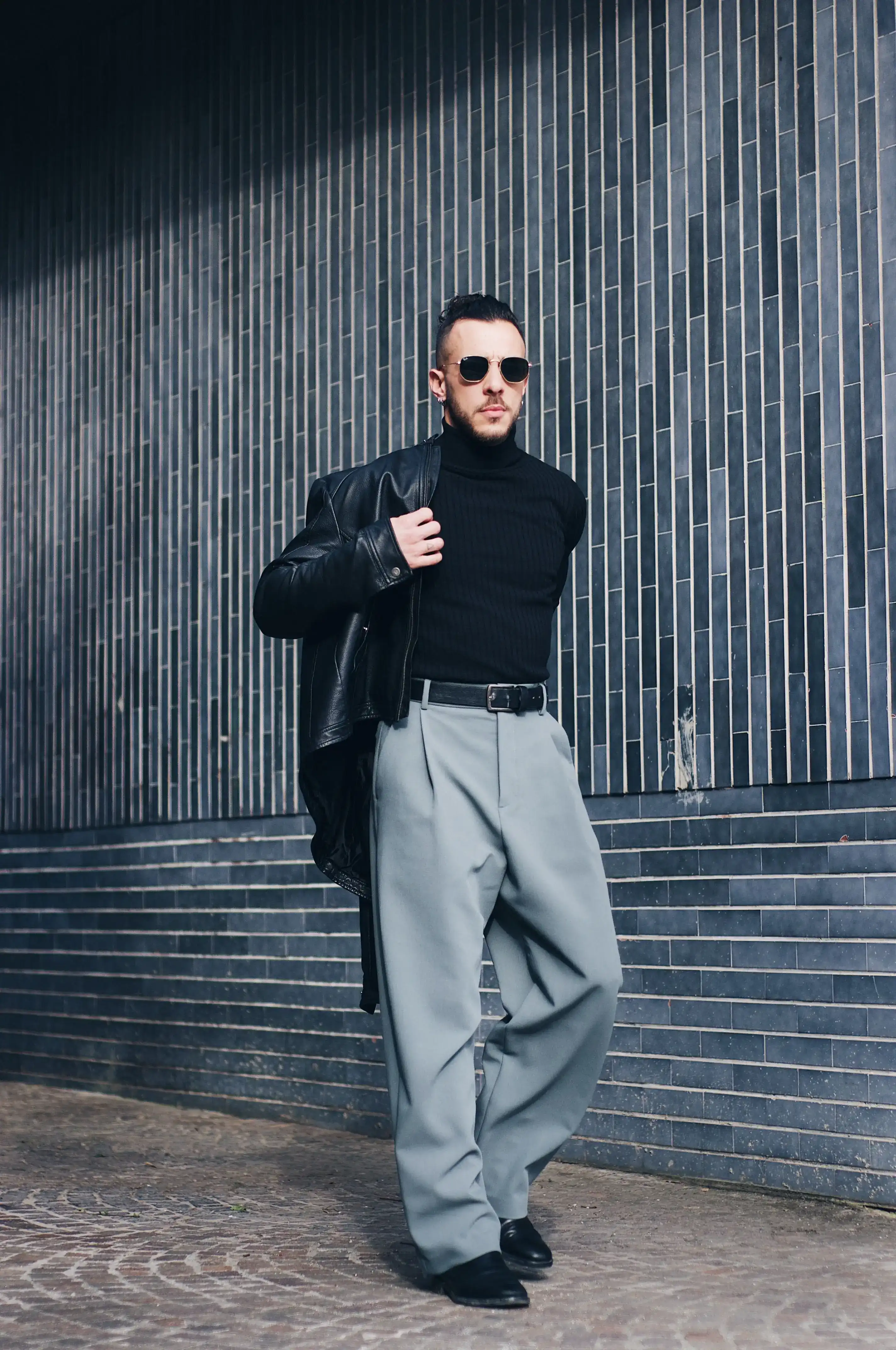 Wide Pleated Trouser worn by a model.