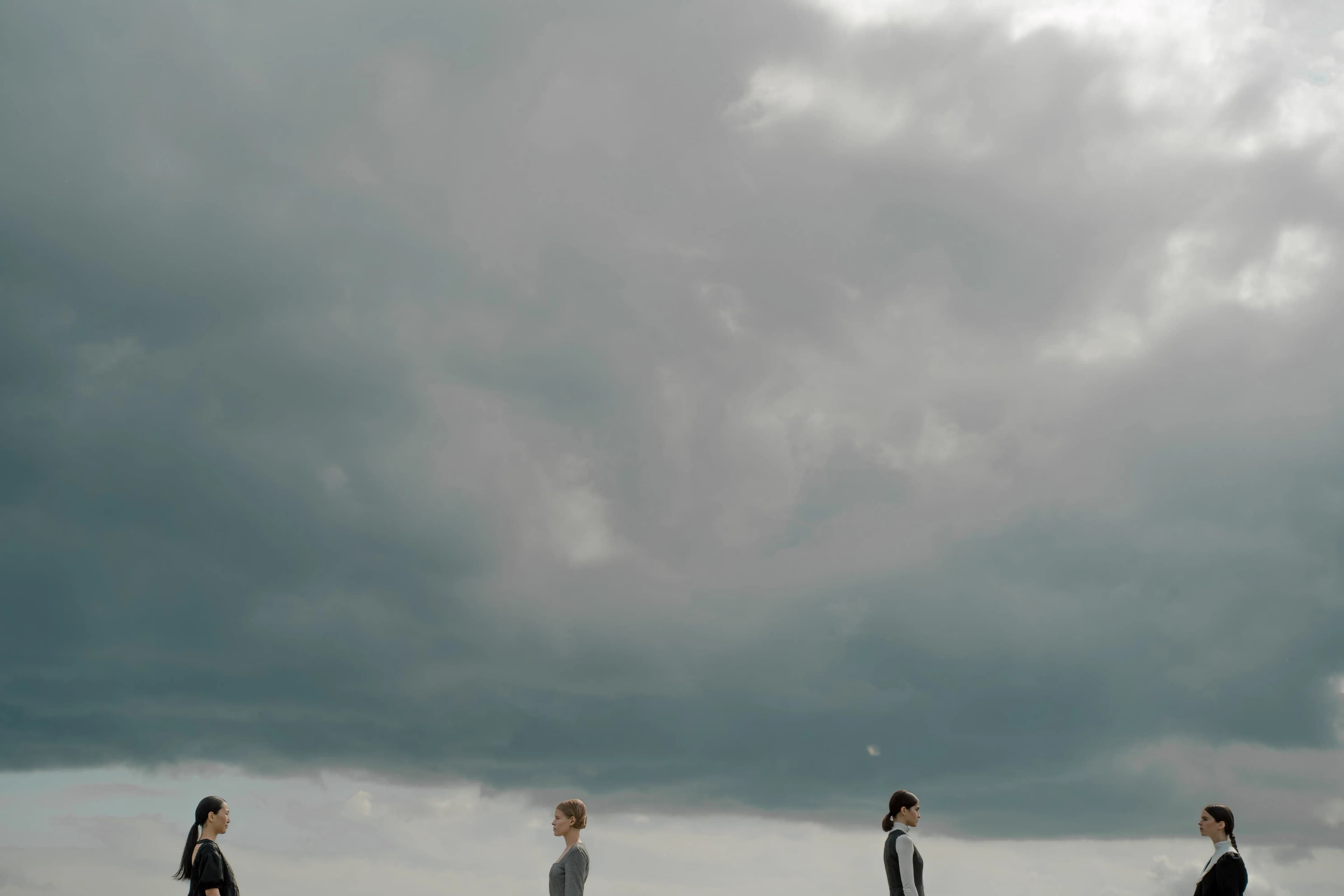 Collection 001, worn beneath a wide sky.